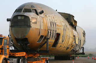 Illustration for article titled Boeing C-17 Fuselage Trucked Through Long Beach Streets In Dead Of Night